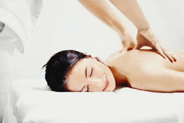 Woman Receiving a Relaxing Aromatherapy Massage