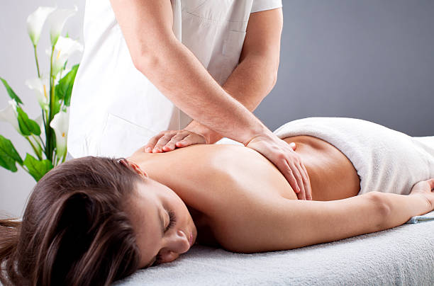 Mobile Massage Therapist Setting Up at Client’s Home